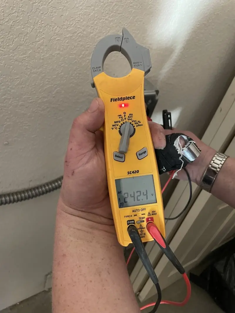 Voltage testing with clamp meter during Ceiling Fan Installation in Spring Ridge